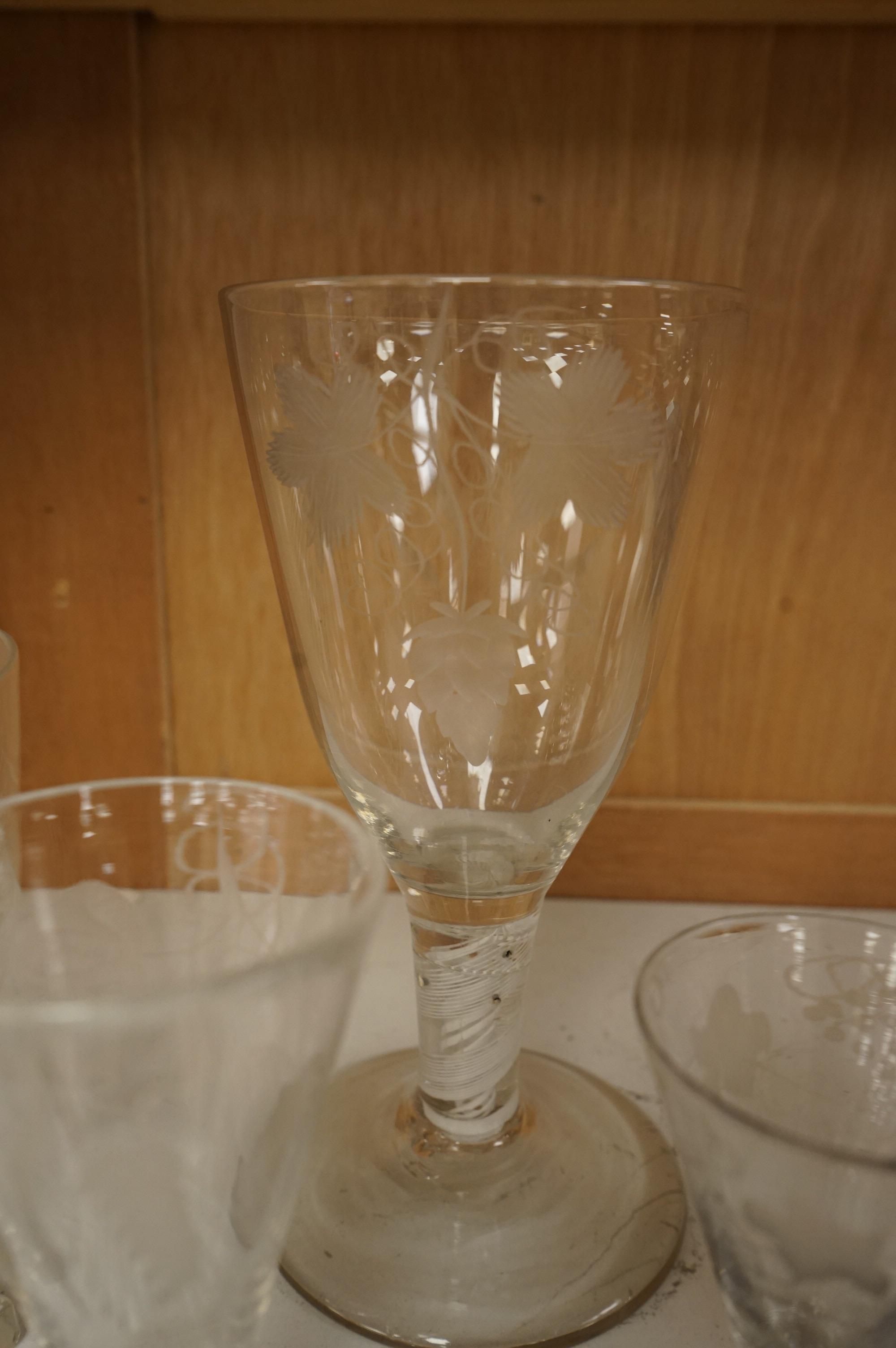 A group of 18th/early 19th century ale glasses, including two rummers, a large DSOT stem glass and two smaller funnel shaped glasses, largest 21cm high (5)